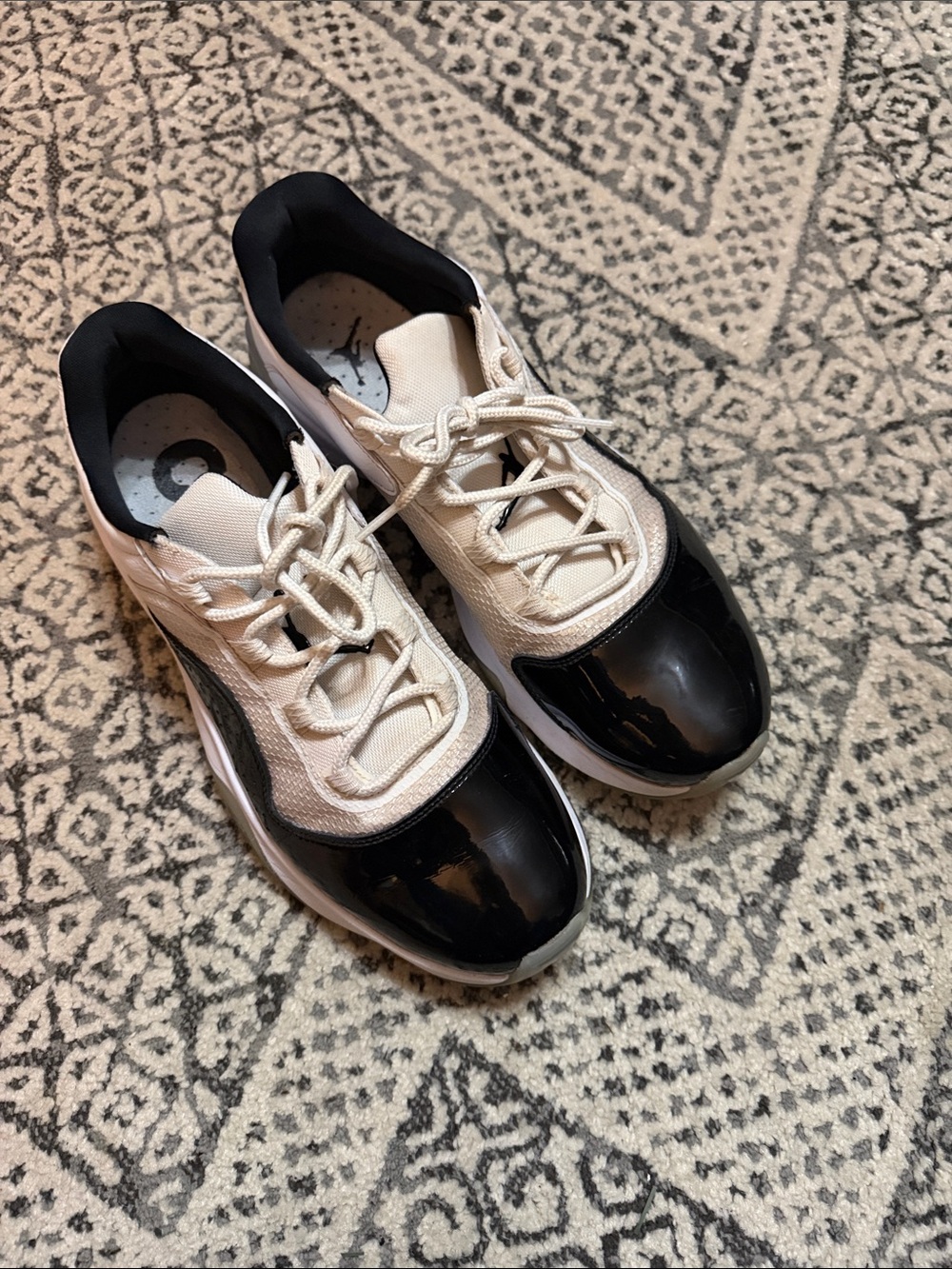 Nike Air Jordan 11 Men's Black and White Low-Top Sneakers